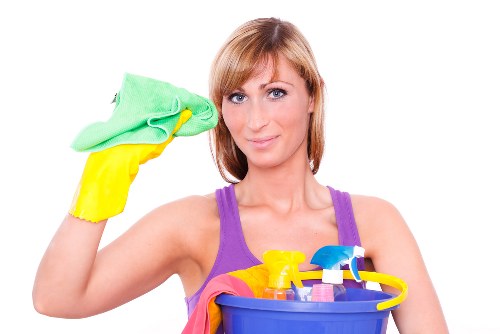Local cleaner carrying out glass cleaning in Canary Wharf